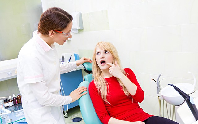 Female patient preparing for wisdom tooth extraction in Chaska