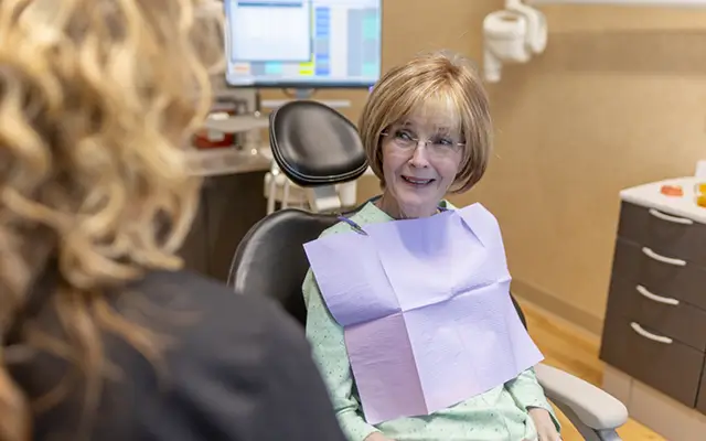 Woman smiling during dental checkup