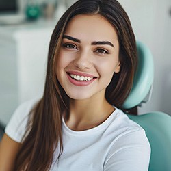 Young woman smiling in the dentist’s chair