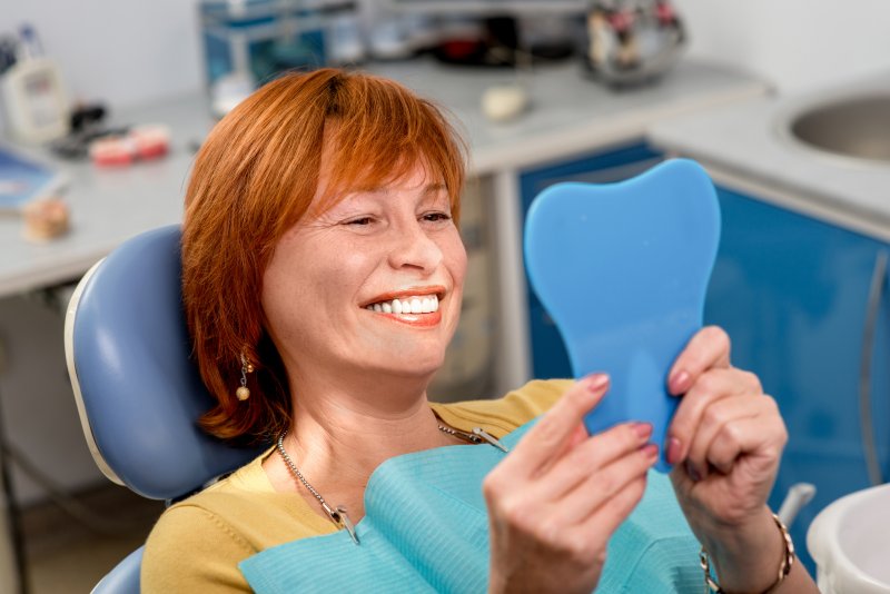 middle-aged woman wearing dentures